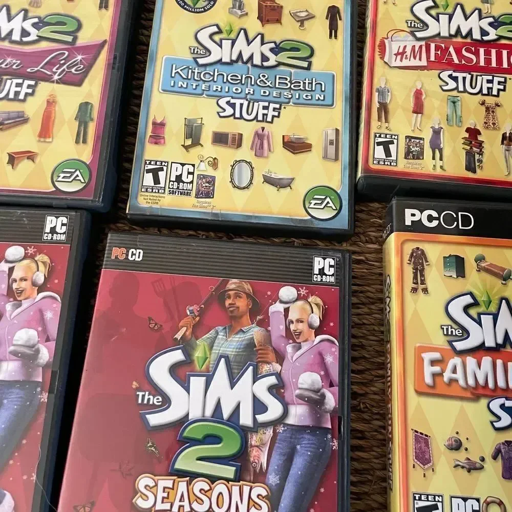 The SIMS PlayStation Vintage Side Video Game Lot PC DVD Pets Family Delux Sets